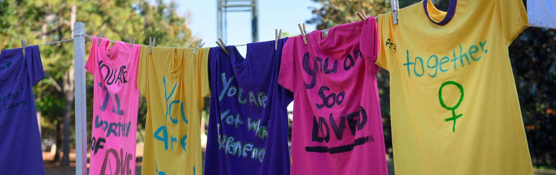 T-shirts on a clothesline with messages of support
